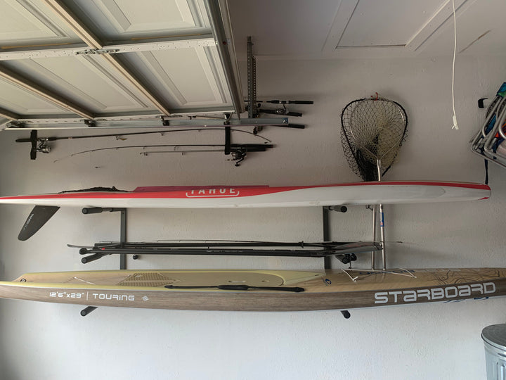 how to hold paddleboards on wall