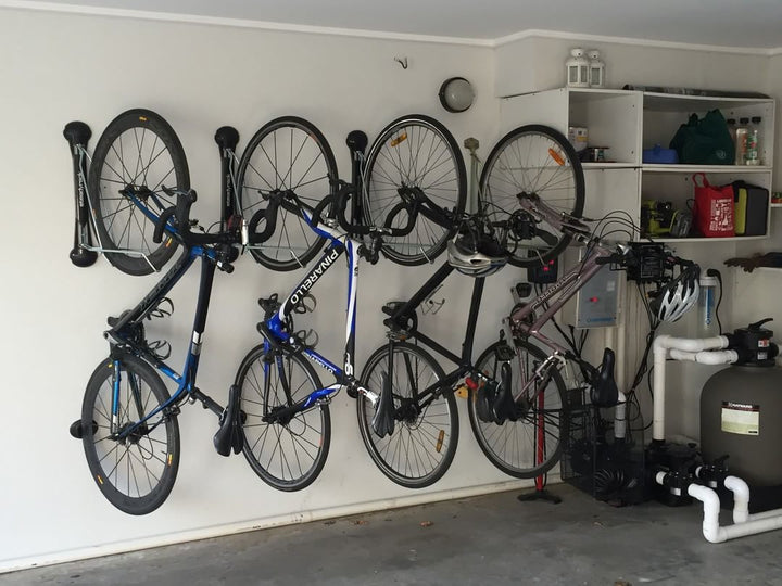 Compact Bike Wall Rack | Swivel Vertical Storage Mount | Tires Up to 2.1" Wide