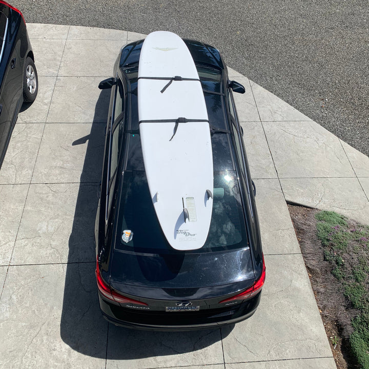 how to strap paddleboard to car