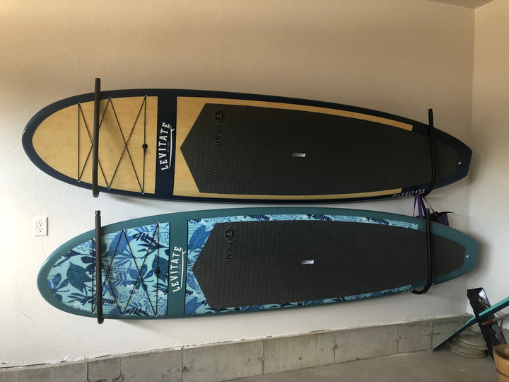 how to hand paddleboards on wall