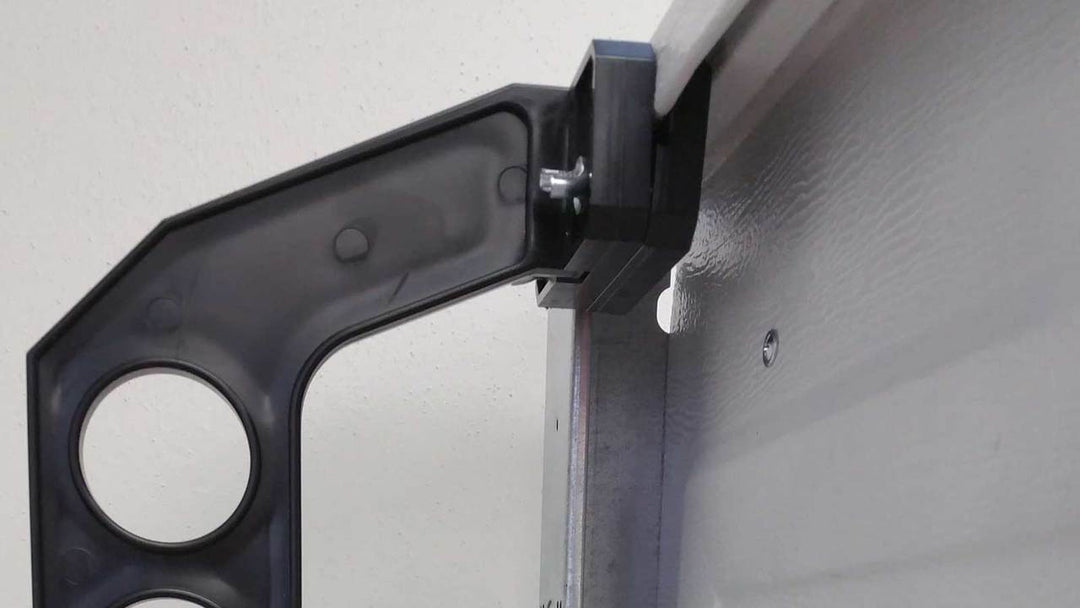 fishing rod holder securely mounts to standard garage door