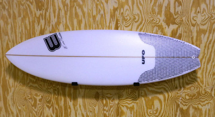 minimalist surfboard wall rack