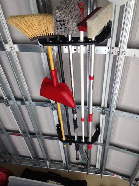 garage door storage rack for brooms