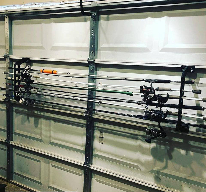 holds fishing rods on inside of garage door