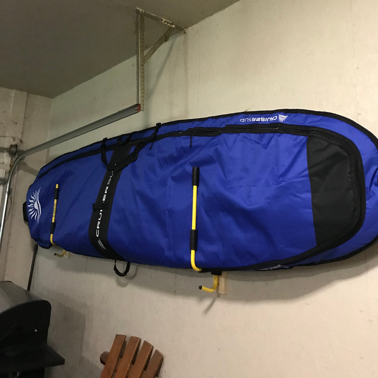 how to hang sup on wall