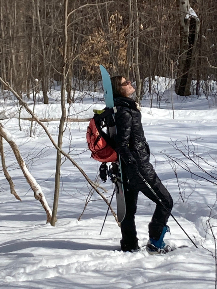 lightweight carry system for taking snowboard into back country