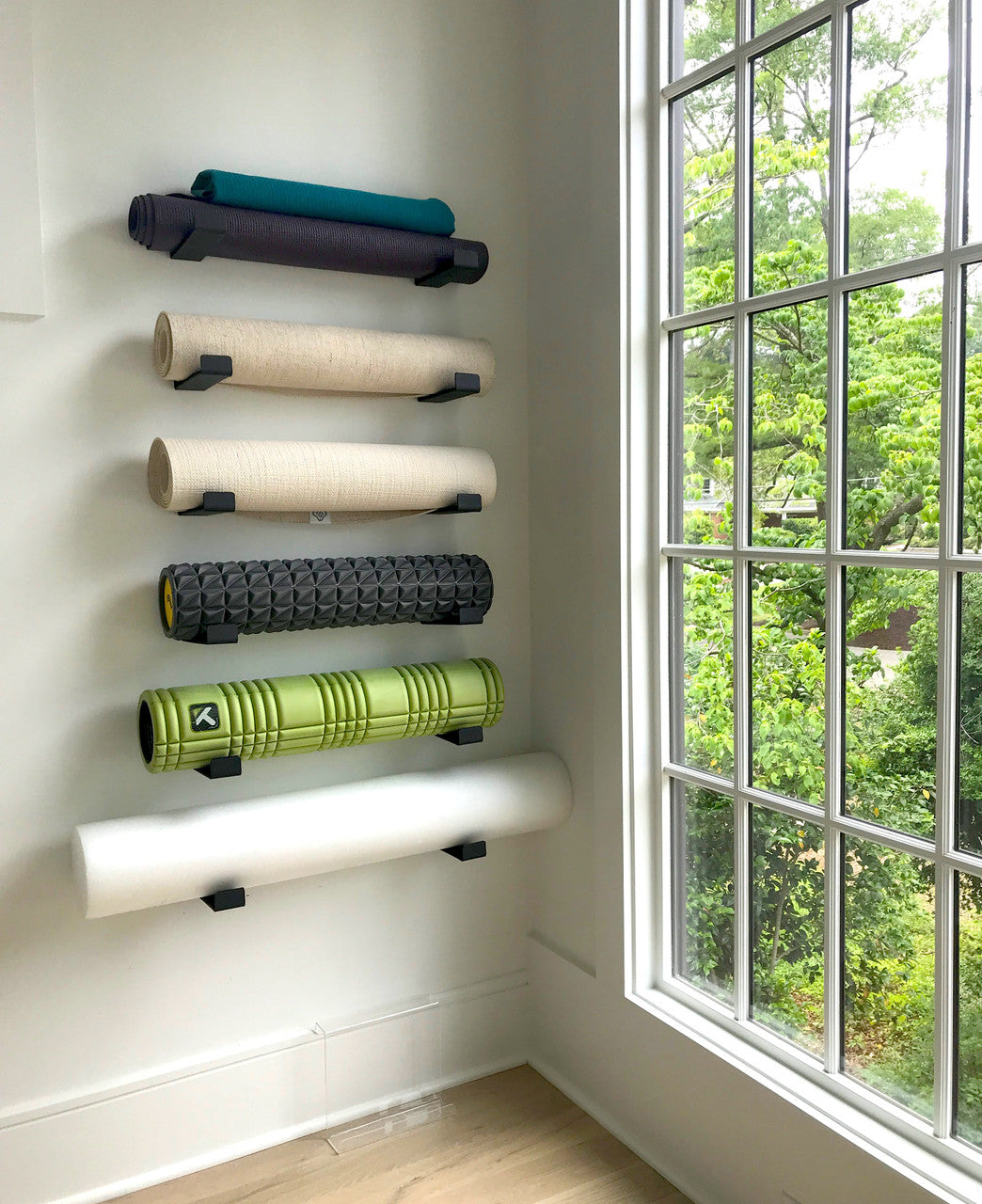 yoga mats on the wall