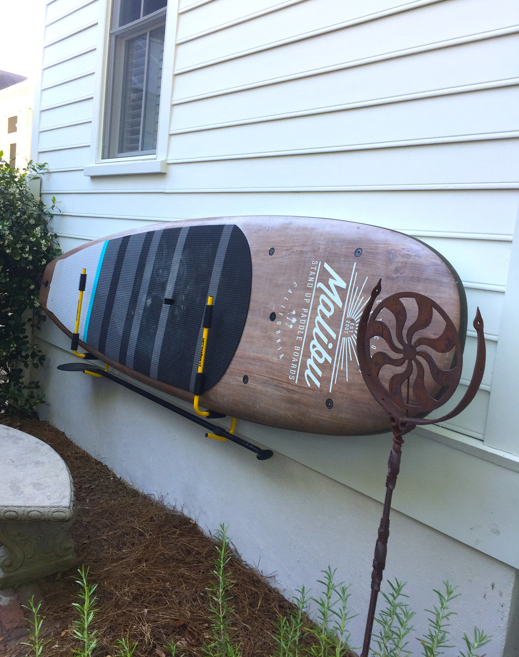 how to hang paddleboard on wall