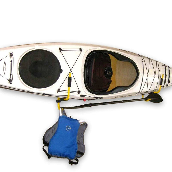 indoor kayak storage with paddle holder