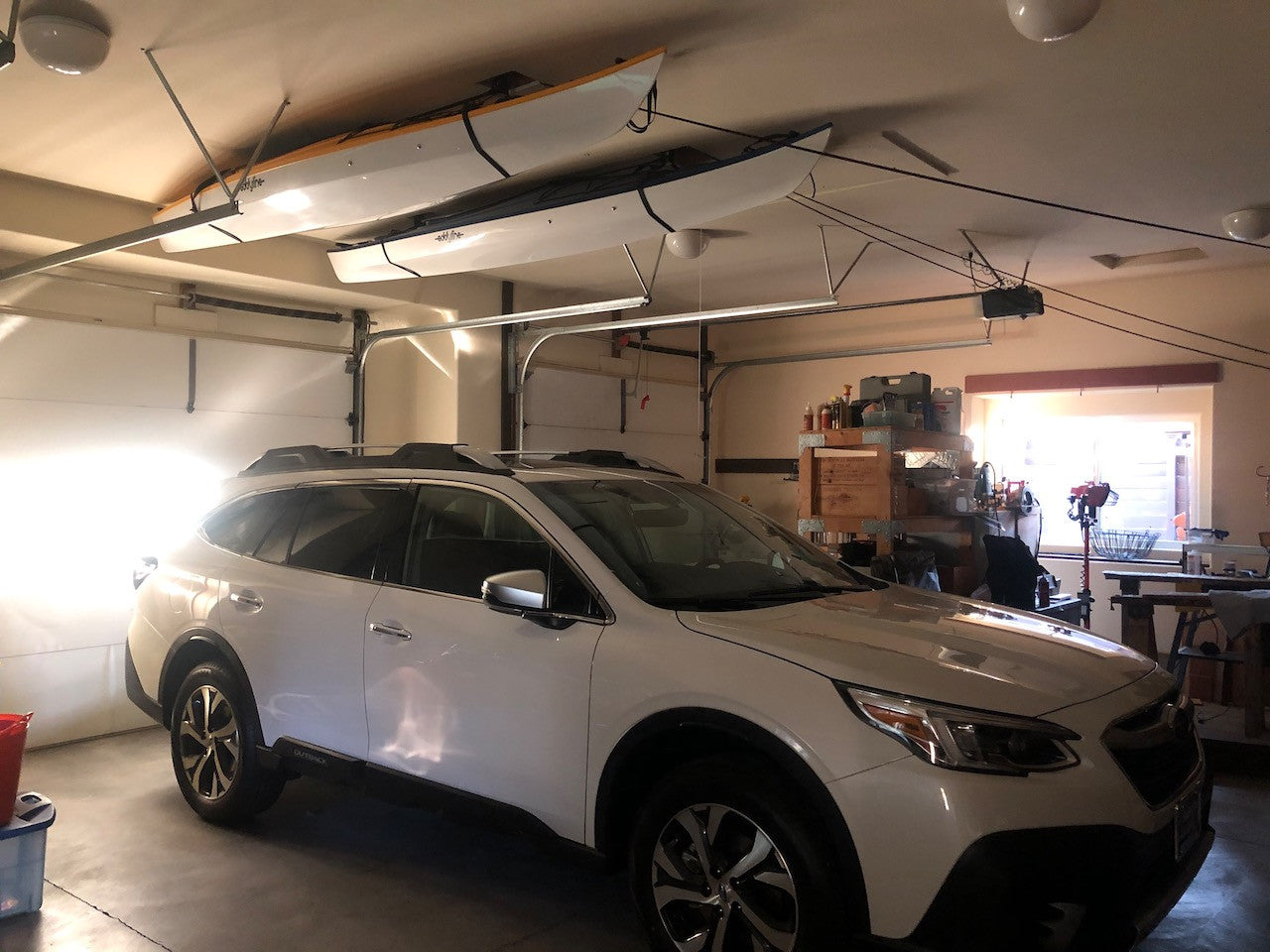 how to hang kayaks in garage 