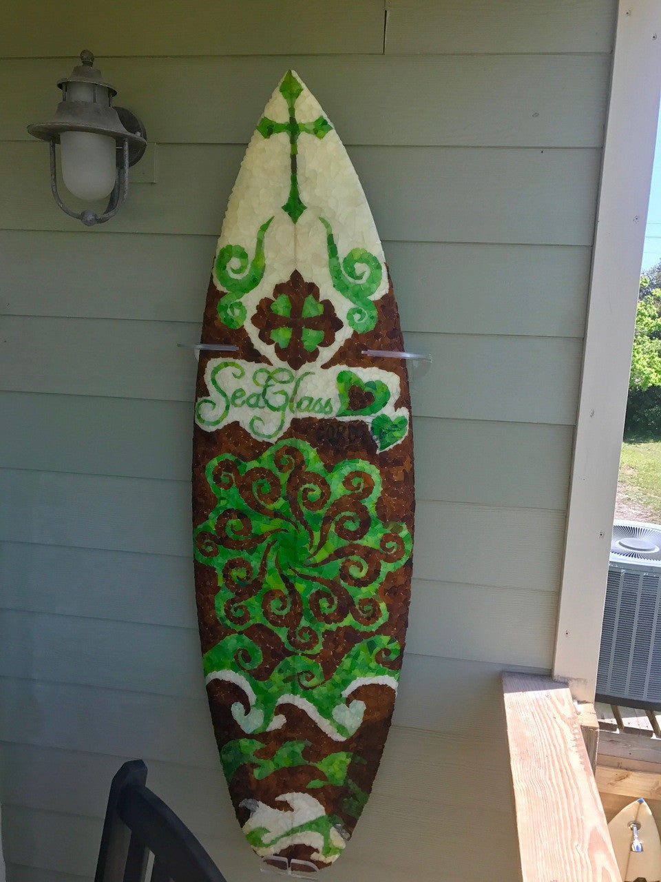 outdoor surfboard wall art hanger