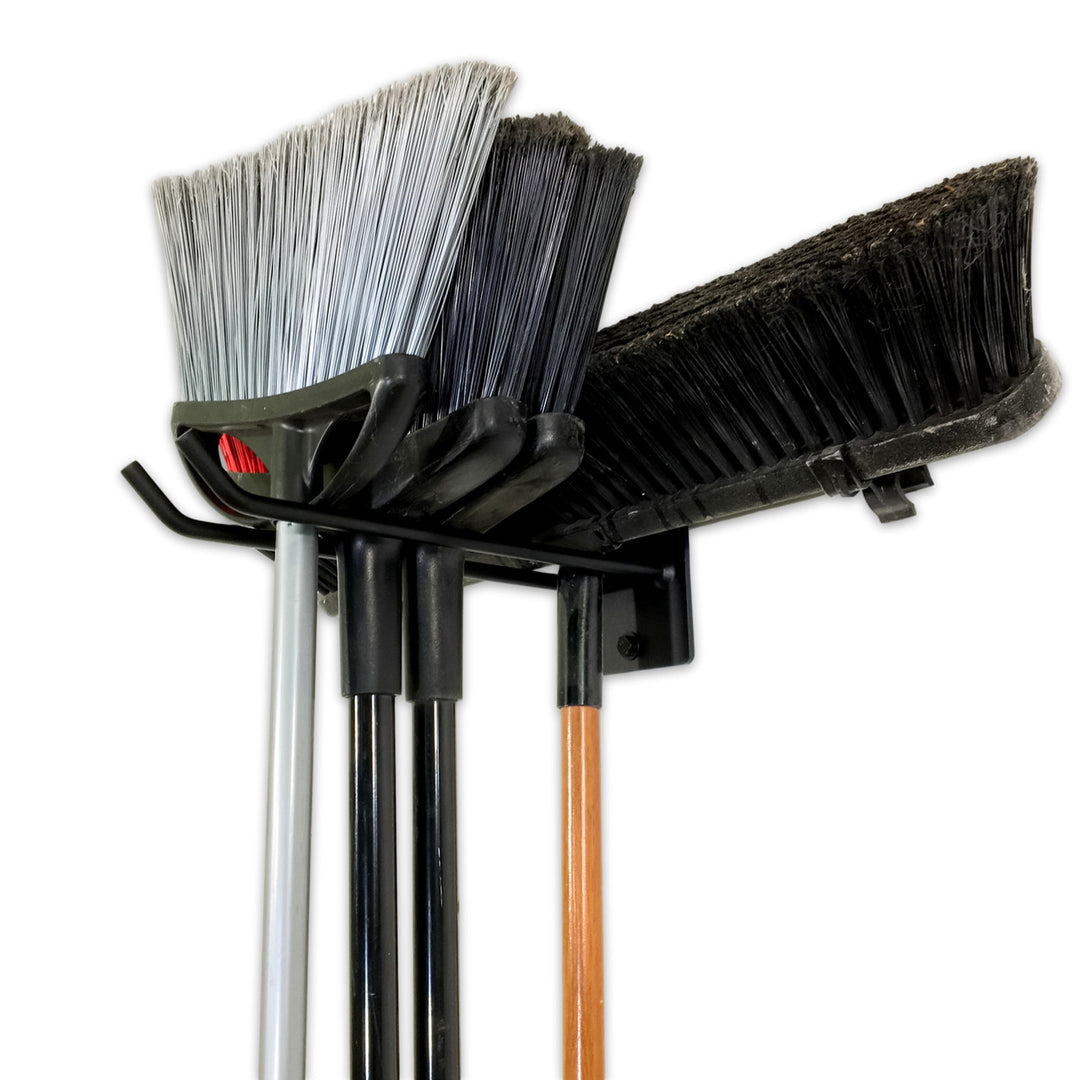 cleaning storage brooms wall 