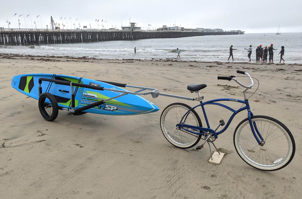 Pull your sup or kayak behind your bike with this trailer