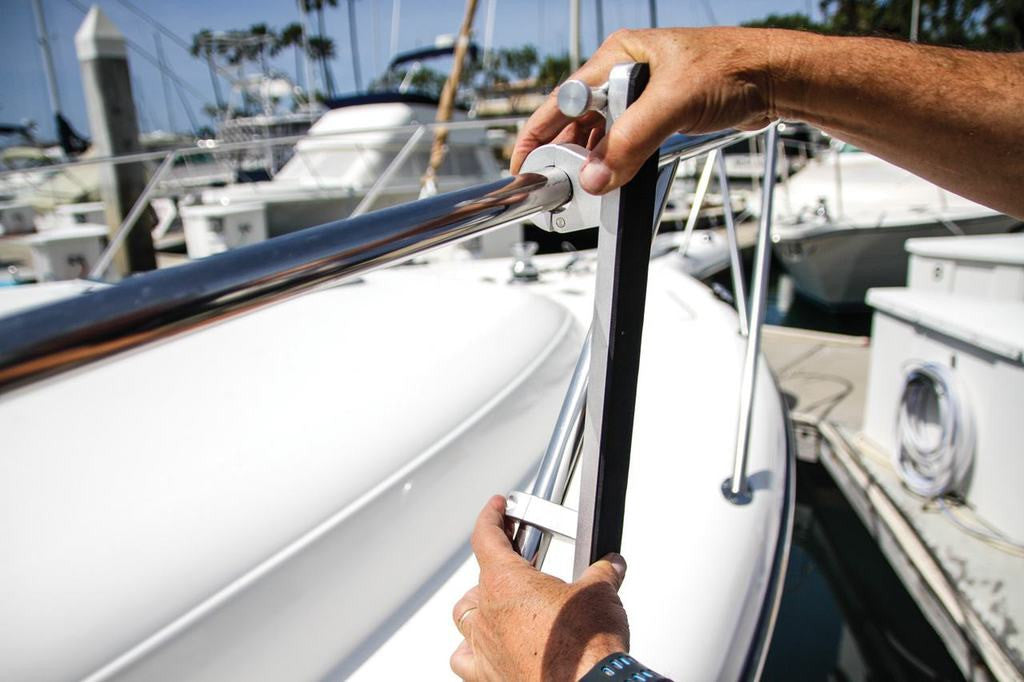 installing paddleboard sailboat rack on railing