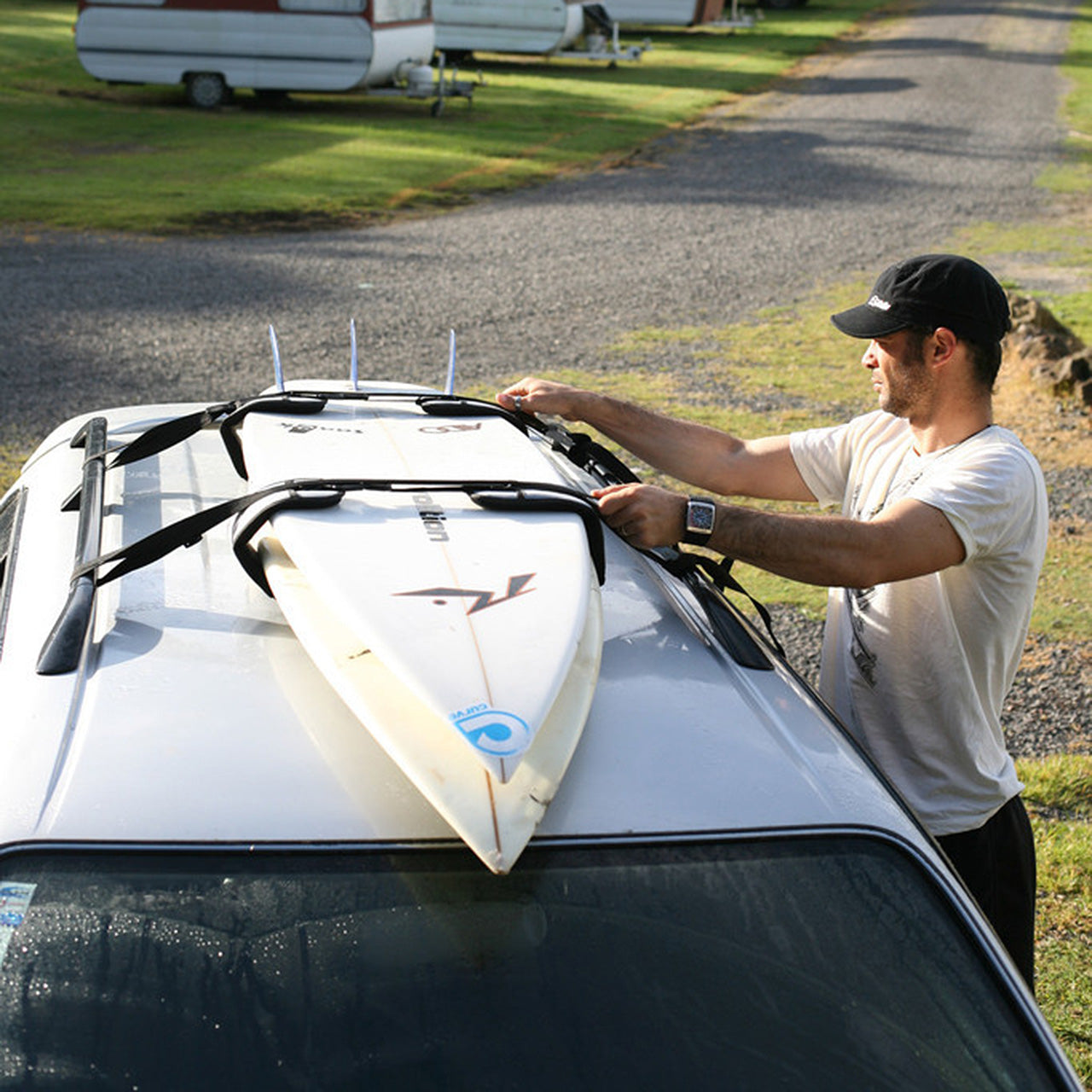 Roof straps for online surfboards