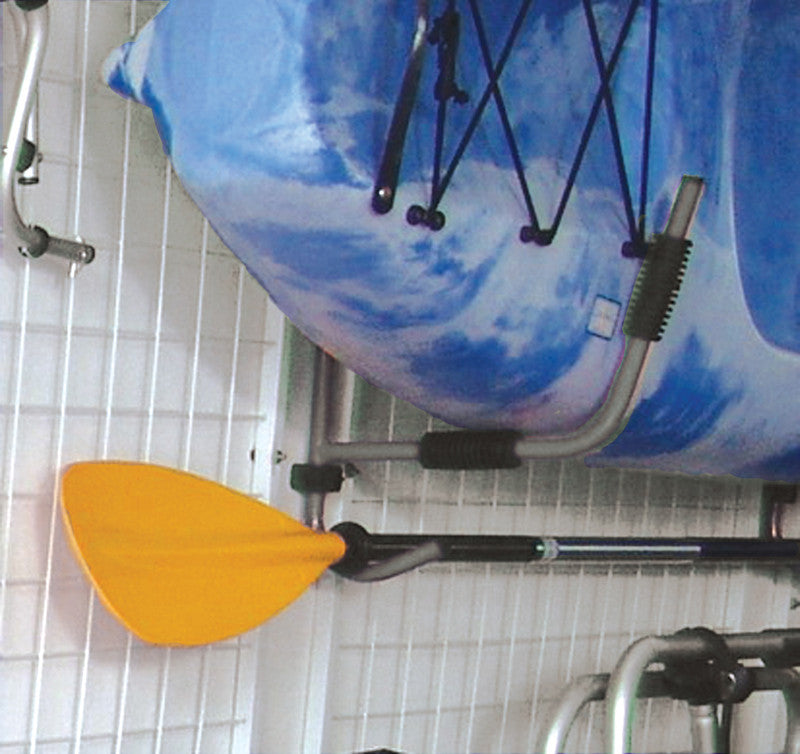 Kayak wall rack with built in paddle holder