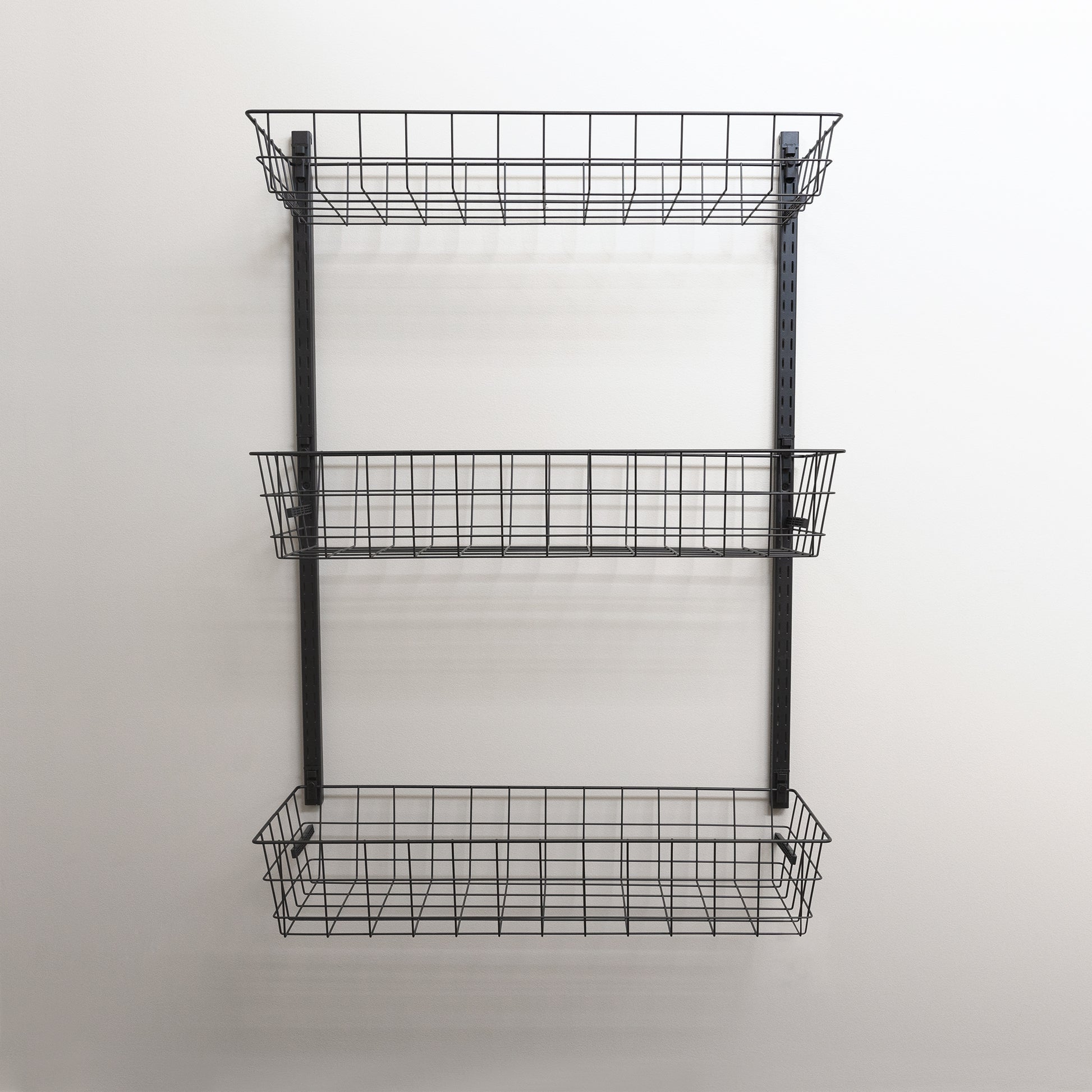 black wire basket wall storage organization