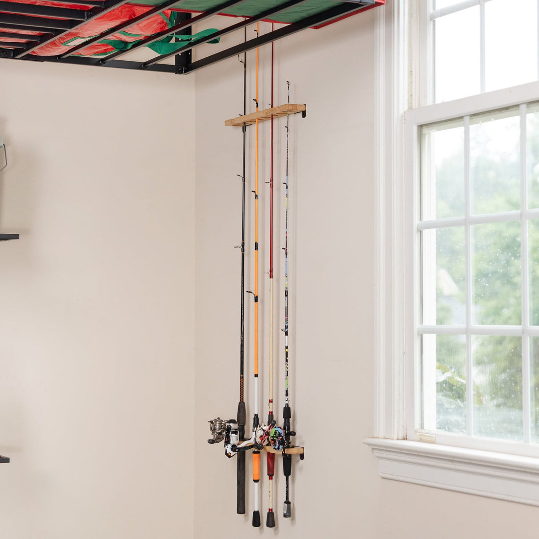 Fishing pole organizer wall mount