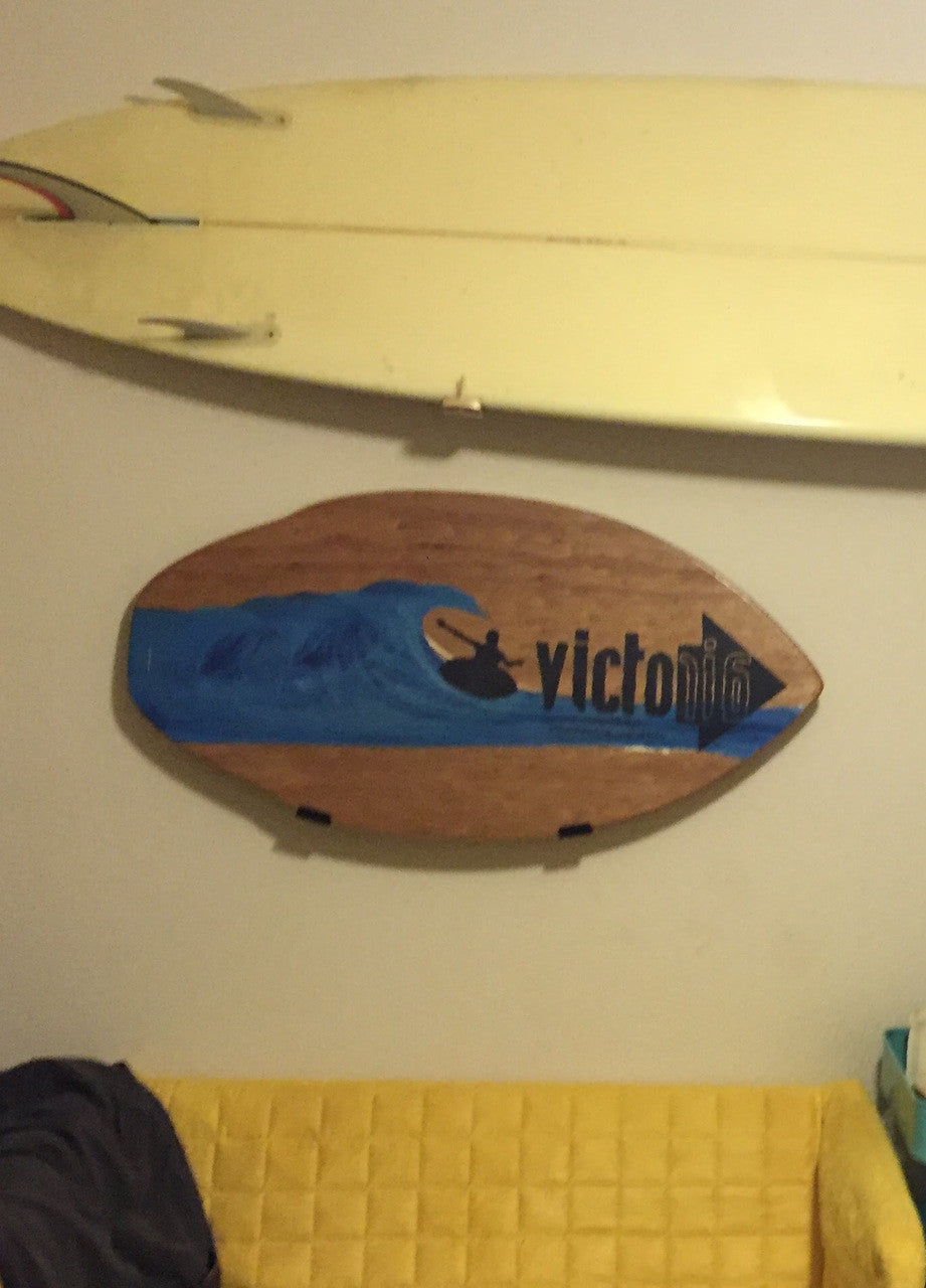 wood skimboard wall rack