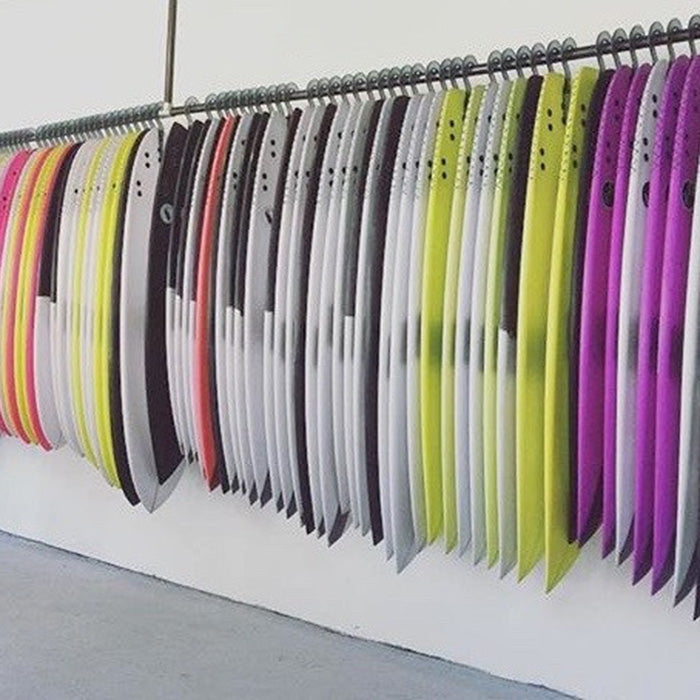 Surfboard fin store hanger